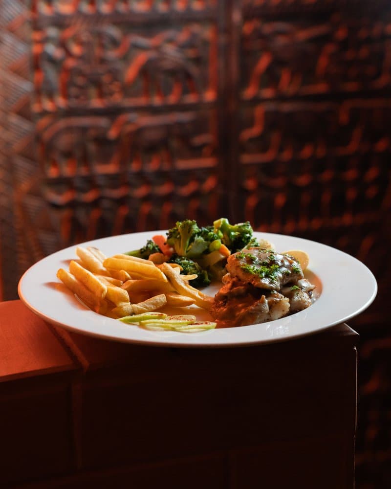 Grilled Chicken with Mithila art backdrop at Koh Bar Thamel